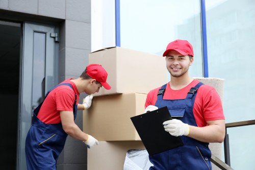 Boxes and household items being loaded for storage pricing estimate