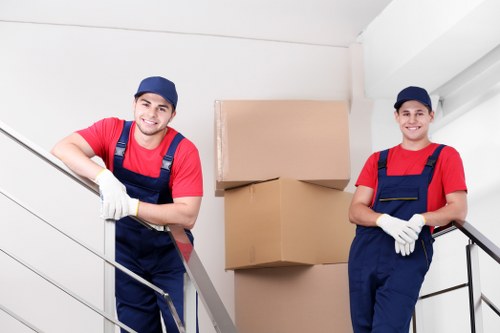 A staff member checking safety conditions in a storage aisle